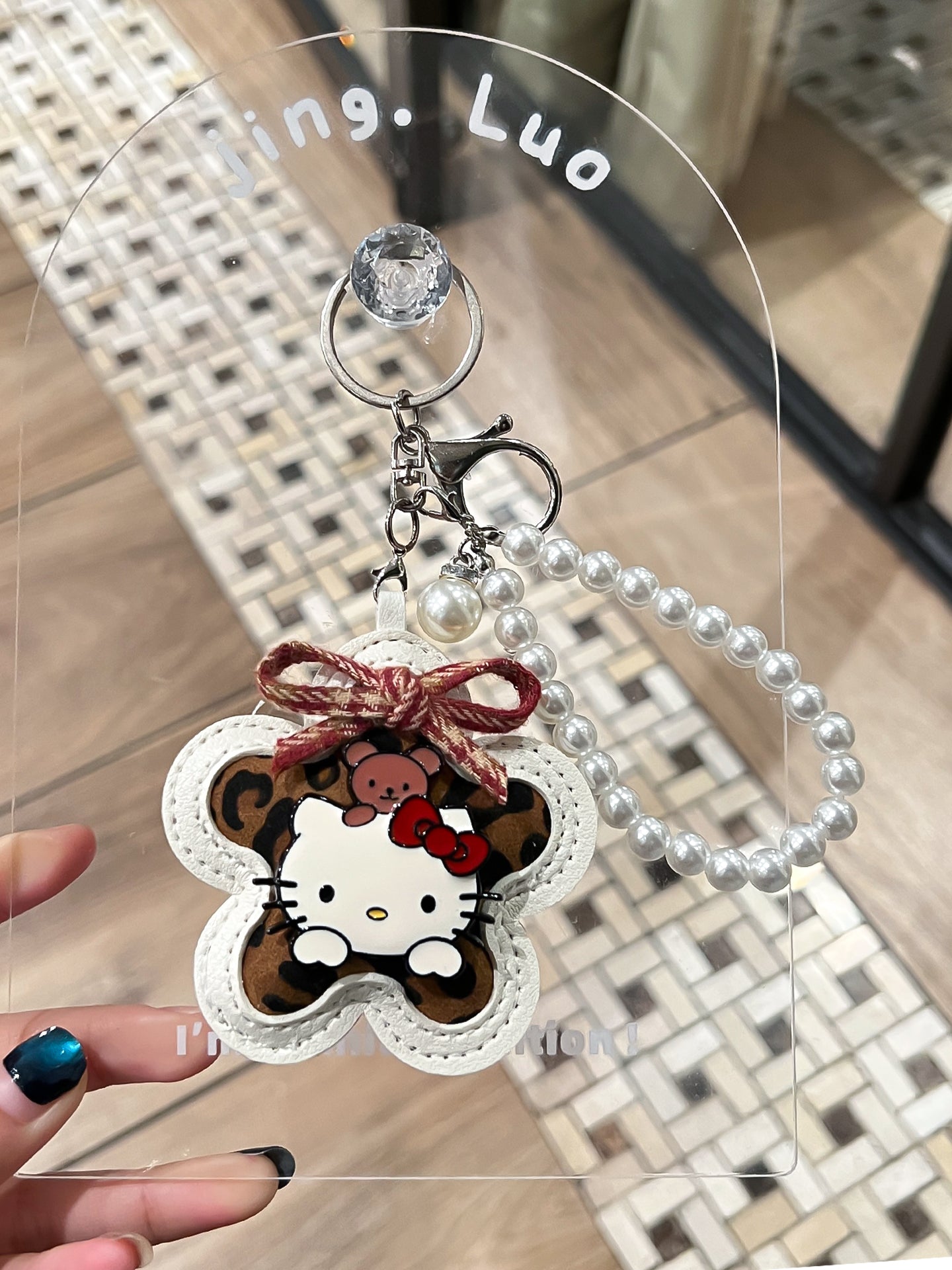 Leopard print Hello Kitty key chain, leather beaded, cute couple pendant, 2026 new Hello Kitty jewelry for women.