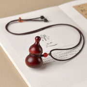 Bənövşəyi səndəl ağacından hazırlanmış balqabaq avtomobil açar zənciri, yaşıl səndəl ağacından hazırlanmış sülh və bəxt kulonu, kişilər və qadınlar üçün yaradıcı portativ zərgərlik.