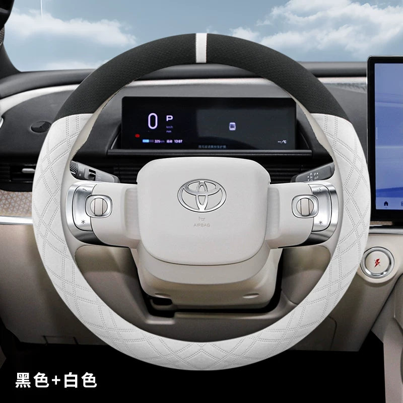 2025 Toyota Corolla üçün sükan örtüyü, zamşa və sürüşməyən, təri udma materialından hazırlanmışdır.