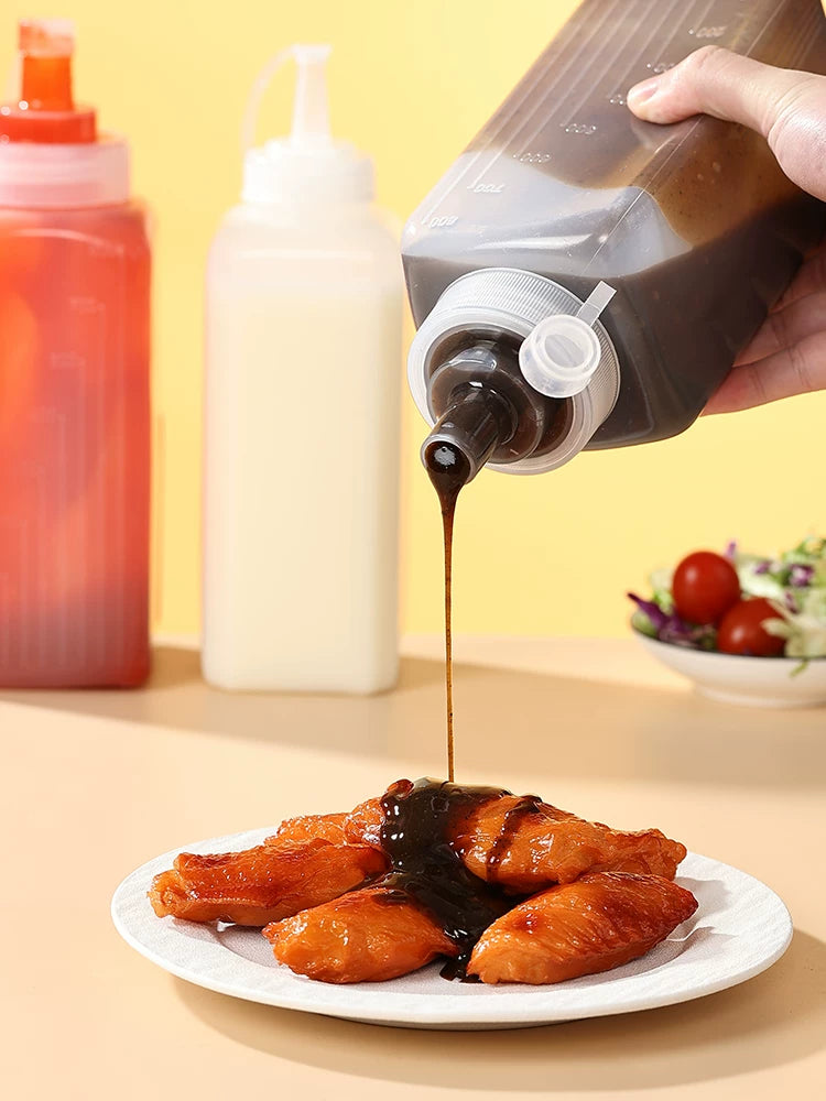 Sıxılmış sous şüşəsi plastik mürəbbə şüşəsi qida dərəcəli salat kommersiya qalınlaşdırılmış mətbəx sousu şüşəsi sıxılmış butulka istiridyə sousu xüsusi