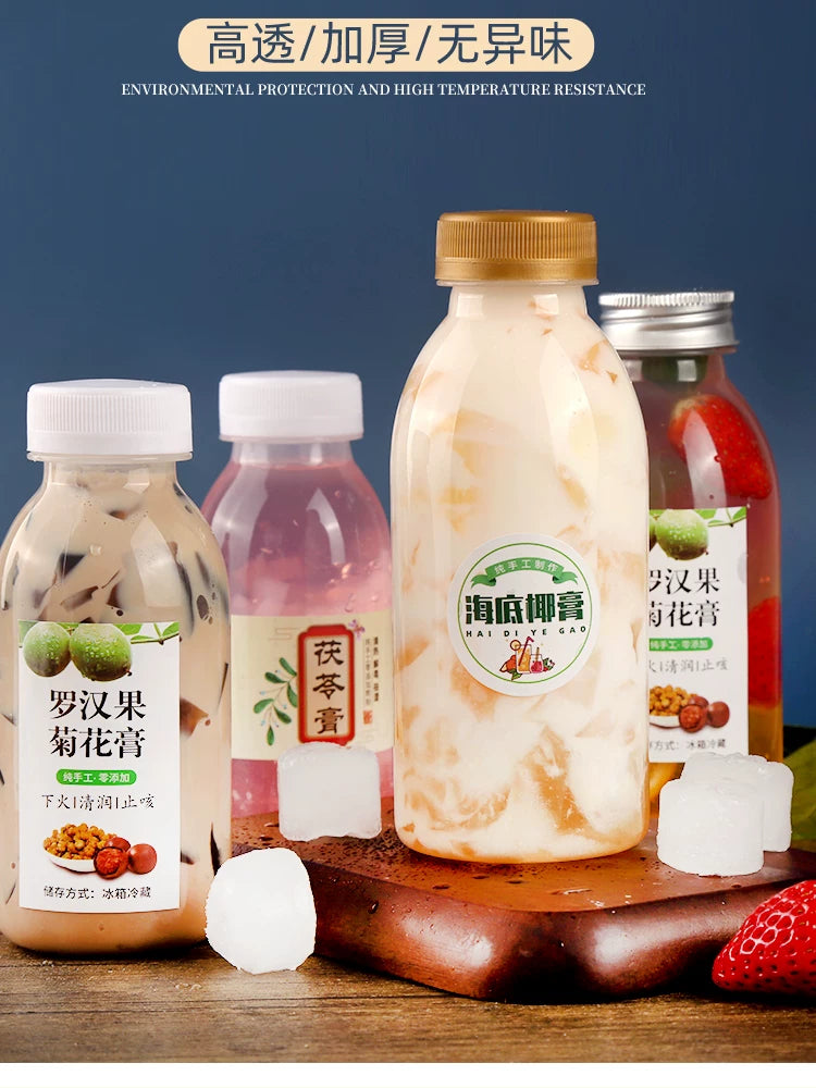 Yüksək temperatura davamlı plastik şüşə PP şüşə qida dərəcəli içki şüşəsi sualtı hindistan cevizi qar armud pastası şüşəsi Luo Han Guo Poria pastası isti içki