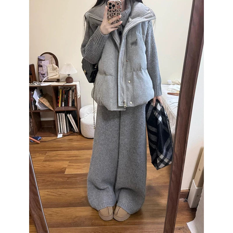 A sleek and lazy three-piece set in Korean style: a stand-up collar vest, a collared cardigan, and gray wide-leg pants.