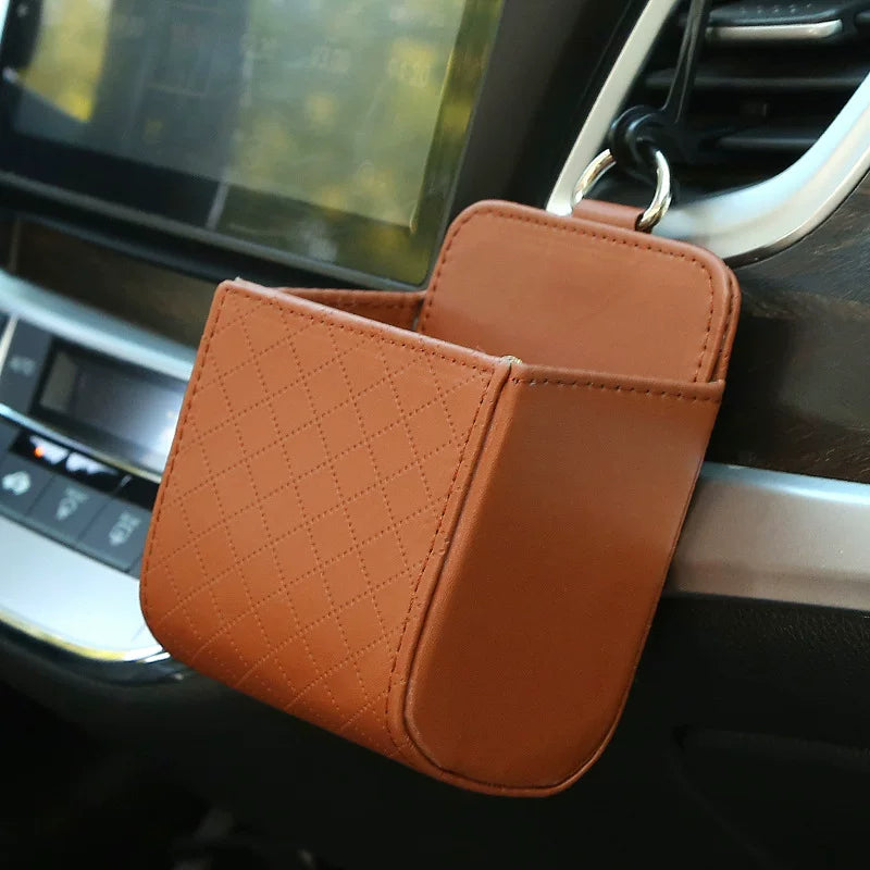Car storage box, car air vents, leather multi-function pocket for mobile phones, cigarettes, coins, cards and drinks.
