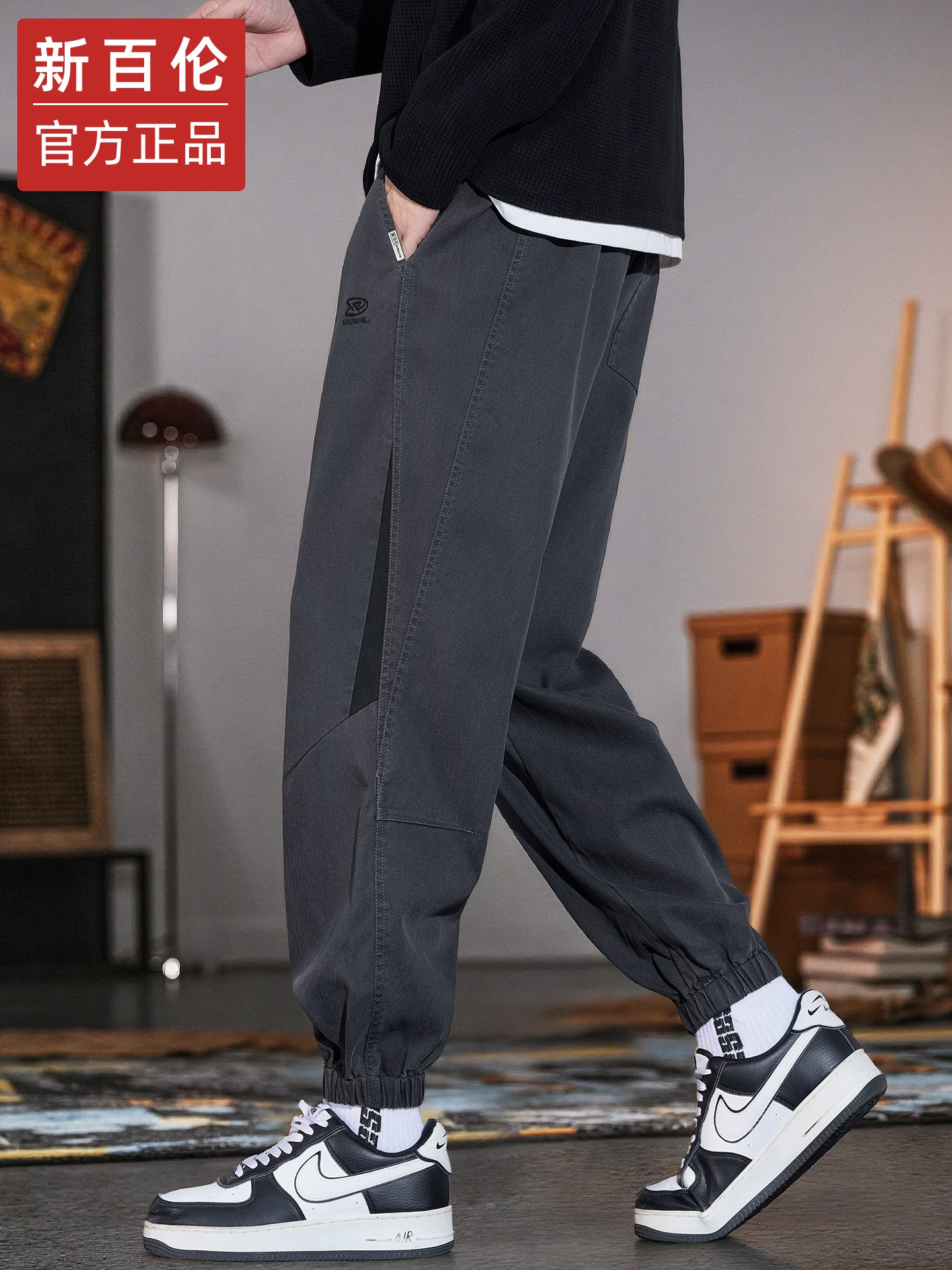 New Balance kişilər üçün Amerika üslublu hərəm cins şalvarı, 2025 payız/qış yeni moda, dəbli boş forma, daralmış ayaq, idman gündəlik şalvar.