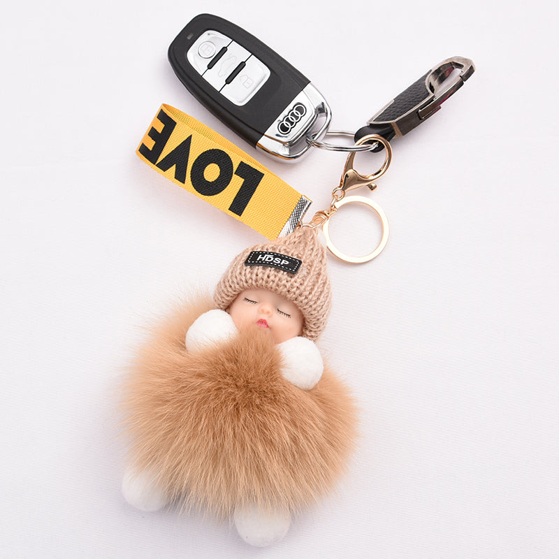 Real fox fur pompom sleep doll for women, cute plush toy, backpack charm, creative car key chain pendant.
