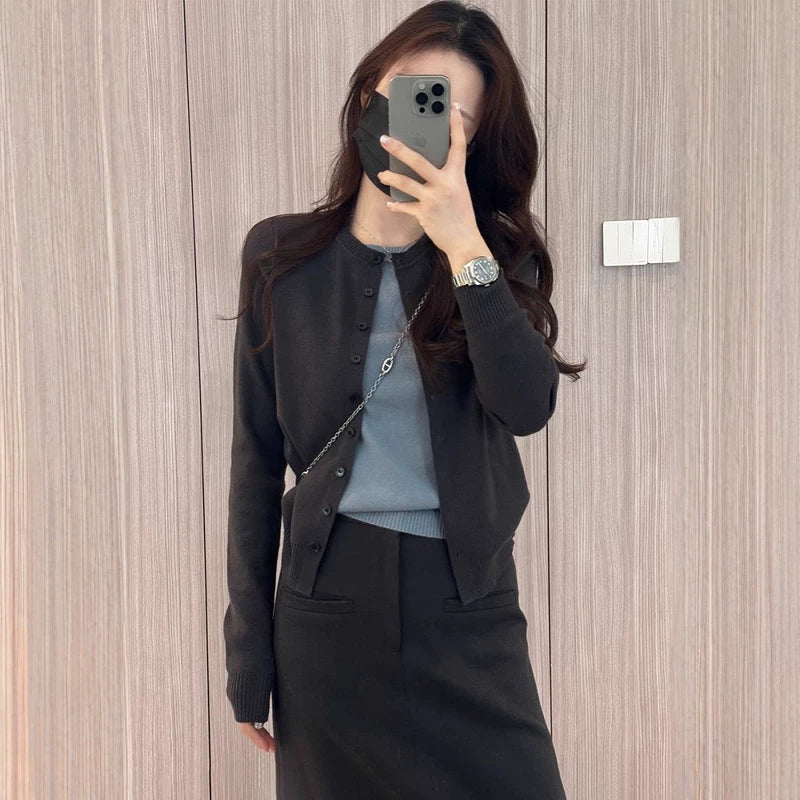 Colorless faux two-piece knit cardigan for plus size women, slimming style, new 2025 fall design, high quality sweater top.