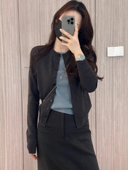 Colorless faux two-piece knit cardigan for plus size women, slimming style, new 2025 fall design, high quality sweater top.