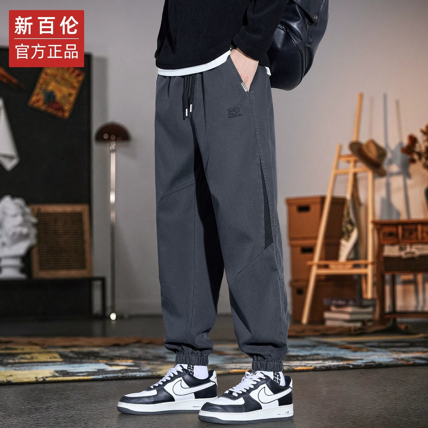 New Balance kişilər üçün Amerika üslublu hərəm cins şalvarı, 2025 payız/qış yeni moda, dəbli boş forma, daralmış ayaq, idman gündəlik şalvar.