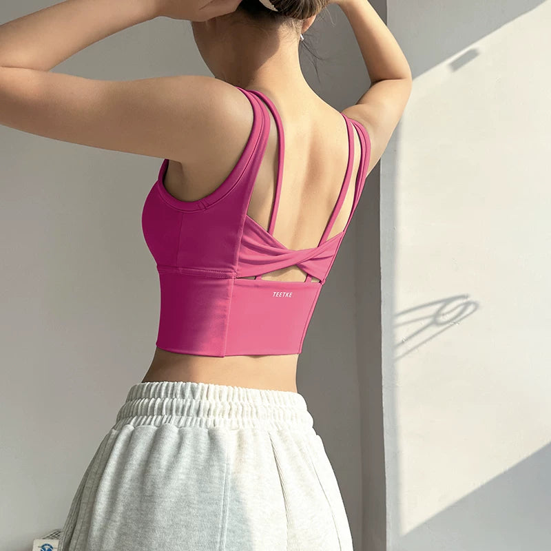 Fitnes qızları gözəl arxa idman büstqalteri zərbəyə davamlı təkanla qaldıran jilet, sarkma əleyhinə yoqa büstqalterinin xarici geyimi