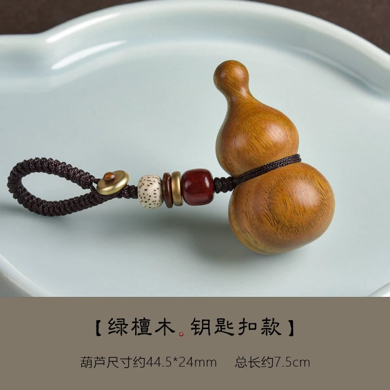 Bənövşəyi səndəl ağacından hazırlanmış balqabaq avtomobil açar zənciri, yaşıl səndəl ağacından hazırlanmış sülh və bəxt kulonu, kişilər və qadınlar üçün yaradıcı portativ zərgərlik.