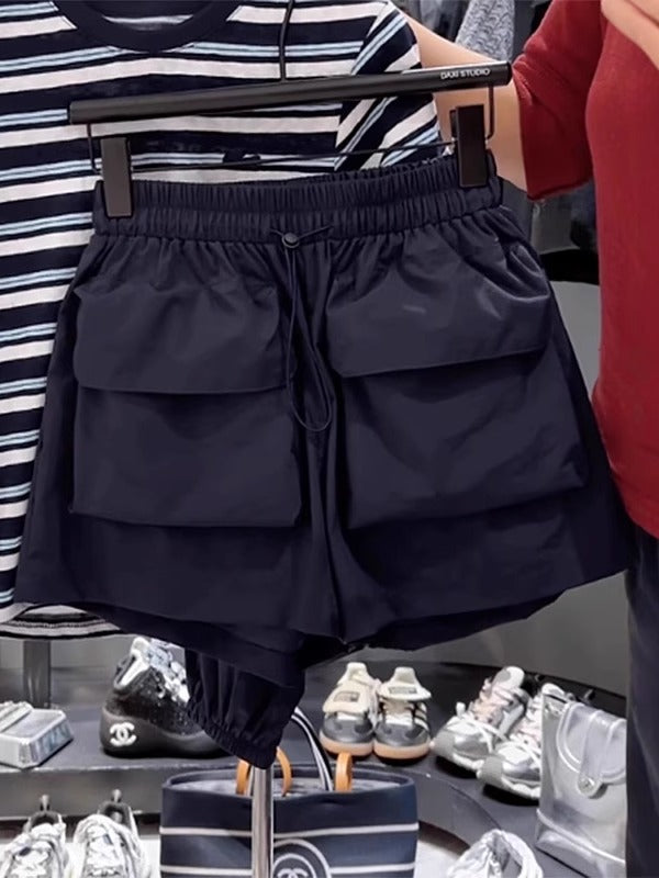 Dəbli A-xətti enli ayaqlı şortlar, yüksək belli, geniş bədən quruluşlu, gündəlik stil, böyük ölçülü qadınlar üçün yeni 2026-cı ilin yay stili, arıqladıcı yük şalvarı.