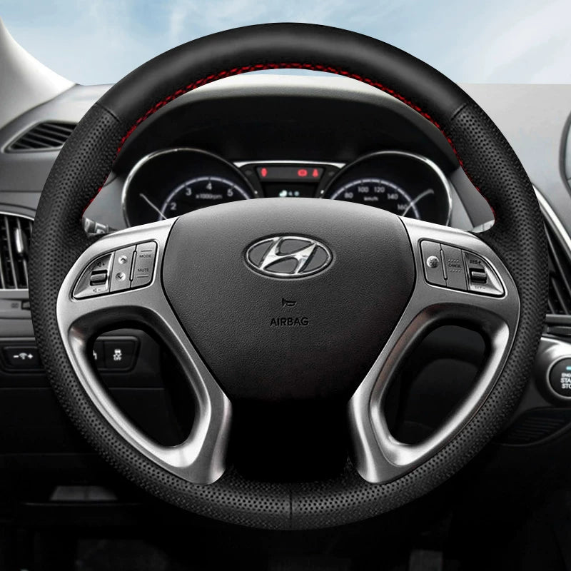 Hyundai Elantra, Hyundai Mistra, Hyundai Yuedong, Tucson və Langdong ix35 üçün qış versiyası üçün əl ilə tikilmiş orijinal dəri sükan örtüyü.
