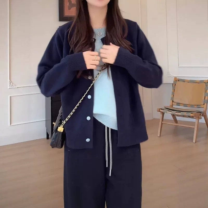 Korean style color-blocked faux two-piece knit women's cardigan, new fall style, oversized, button-up, slimming, loose sweater top.