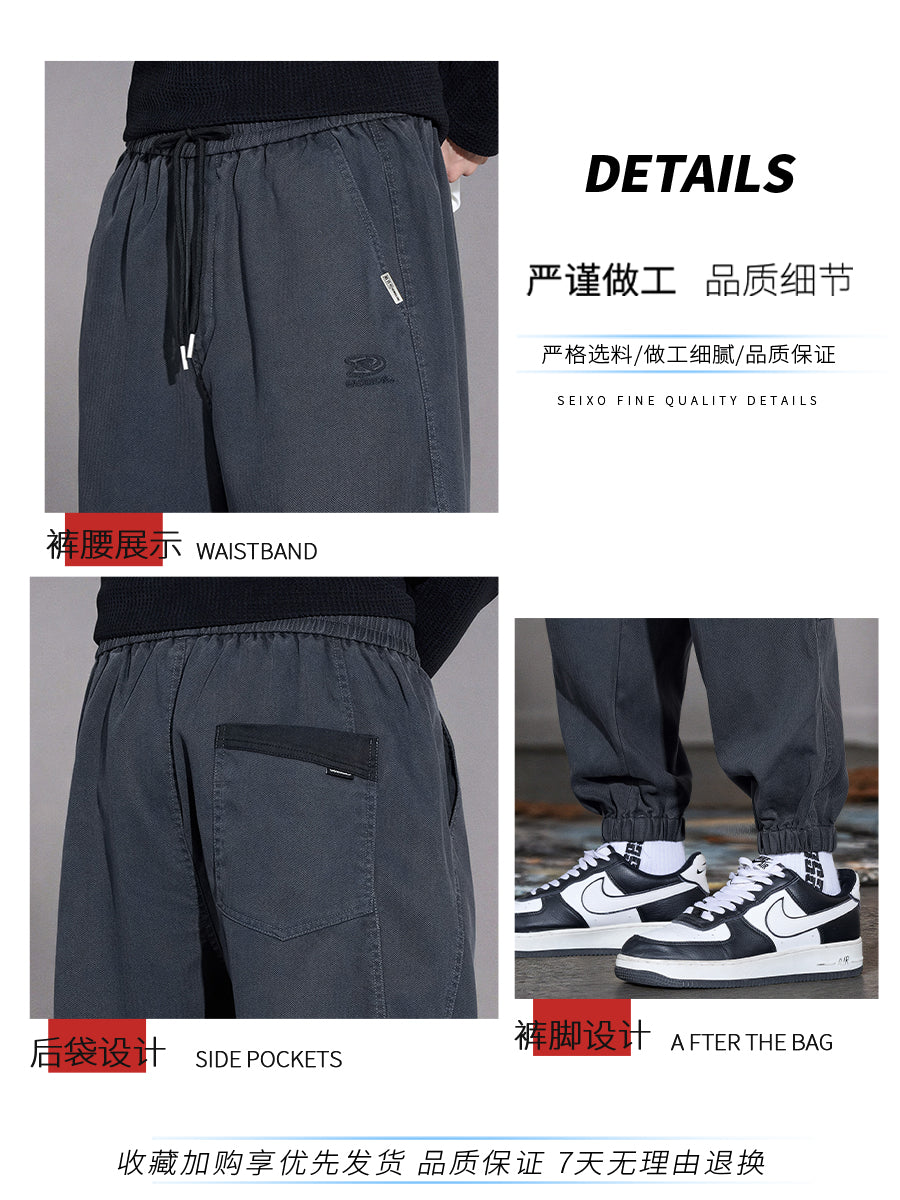 New Balance kişilər üçün Amerika üslublu hərəm cins şalvarı, 2025 payız/qış yeni moda, dəbli boş forma, daralmış ayaq, idman gündəlik şalvar.