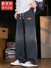 New Balance kişilər üçün Amerika üslubunda enli ayaqlı cins şalvar, 2025-ci ilin payız/qış yeni üslubunda, boş, düz ayaqlı Tencel gündəlik şalvarı.