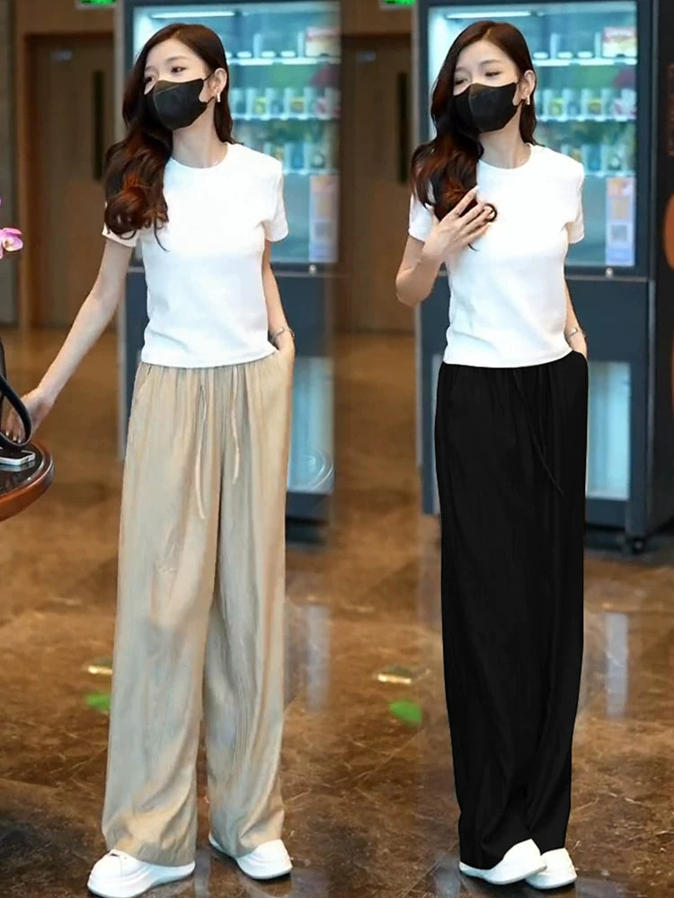 Qadınlar üçün tam yay moda paltarı. Bu ilin məşhur arıqlayan qısaqol köynək + buz ipək geniş paçalı şalvar iki parça dəsti