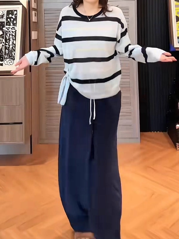 Böyük ölçülü, qalstuklu, uzunqollu, zolaqlı, erkən yaz, arıqlama və boş forma üçün ideal olan, daxili və ya əsas üst geyim kimi ideal olan qadın futbolkası.