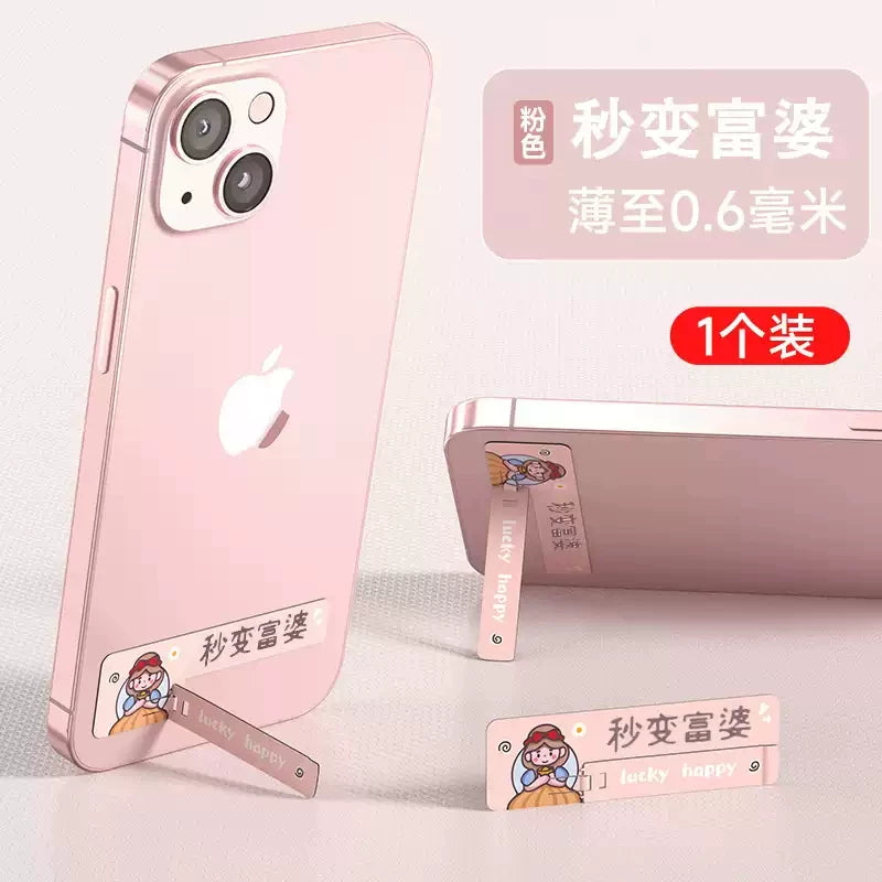 Yapışqanlı arxalığı, görünməz metalı olan yaradıcı masaüstü telefon dayağı, möhkəm, ultra nazik, çoxfunksiyalı, qatlanan, portativ, istifadəsi asan, yeni stil, şirin cizgi filmi cütlük dayağı, kişilər və qadınlar üçün mini üzük tutacağı.