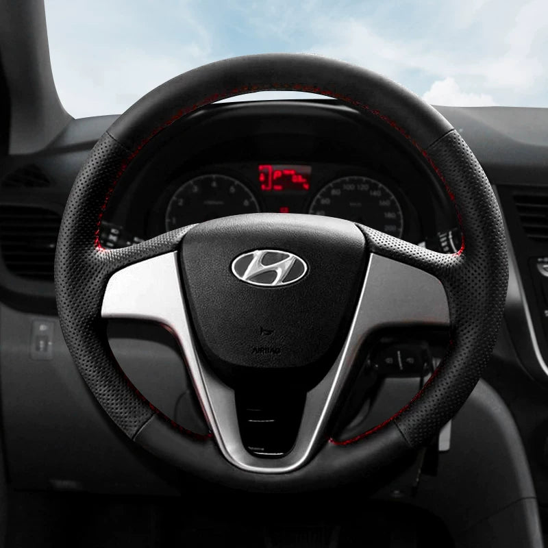 Hyundai Elantra, Hyundai Mistra, Hyundai Yuedong, Tucson və Langdong ix35 üçün qış versiyası üçün əl ilə tikilmiş orijinal dəri sükan örtüyü.