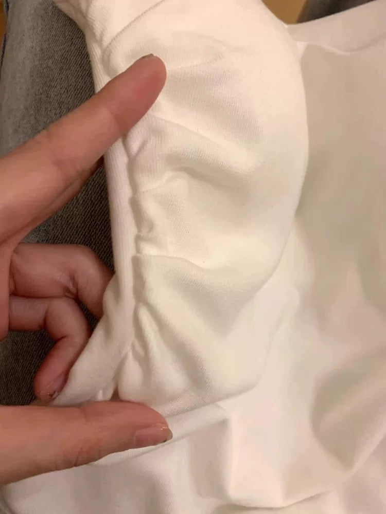Qadınlar üçün yayda içəridə və çöldə geyinmələri üçün döş yastıqları olan gözəl arxa ağ, saf şəhvət üslubunda kamzula, unikal və incə üst paltarlar