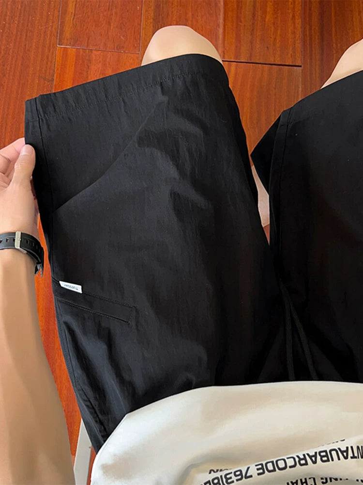 Yapon tez quruyan təsadüfi şort kişi yay xarici geyimi nəfəs ala bilən moda boş düz şalvar kişi iş paltarı beş nöqtəli şalvar