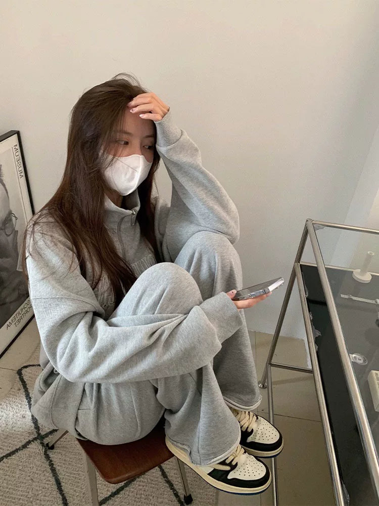 Qadın üçün Amerika üslubunda boz polo yaxalıqlı sviter, nazik, geniş, böyük ölçülü, Honq Konq üslubunda şık fermuarlı top/gödəkçə.