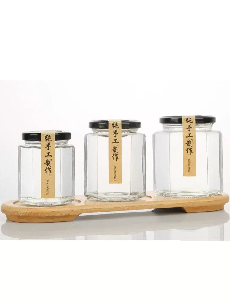 Şüşə qab, altıbucaqlı şüşə butulka, bal şüşəsi, konservləşdirilmiş çili sousu, qapaqlı xüsusi qida qabı, möhürlənmiş boş şüşə
