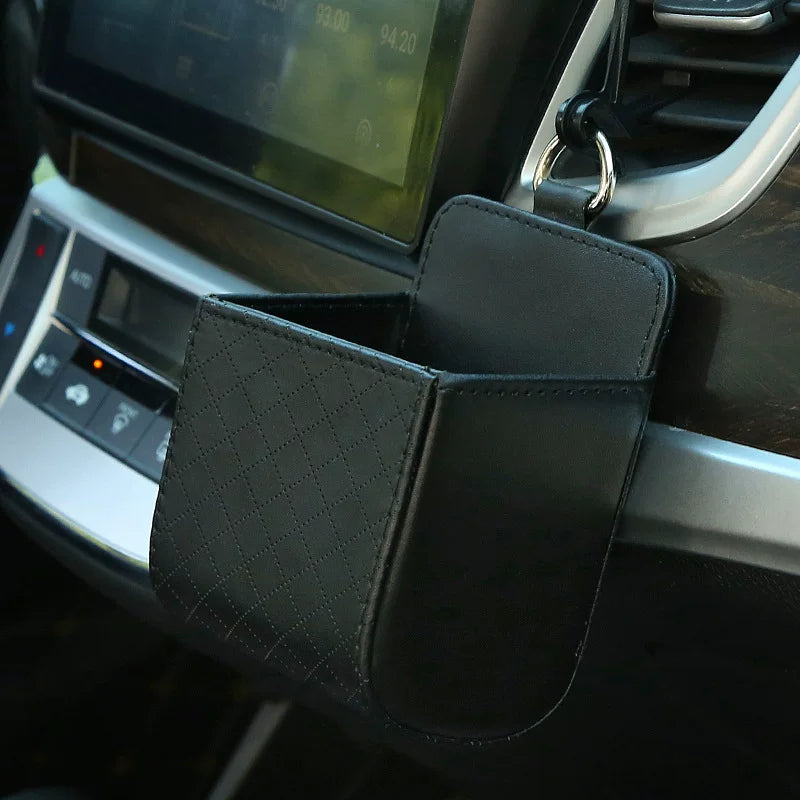 Car storage box, car air vents, leather multi-function pocket for mobile phones, cigarettes, coins, cards and drinks.