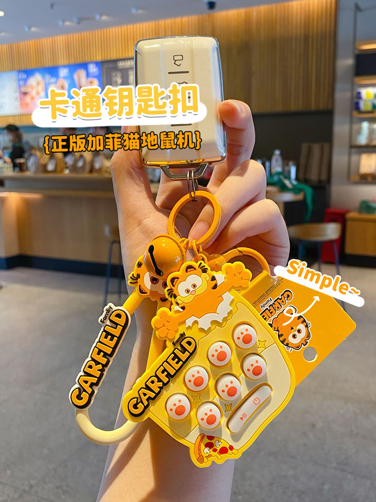 2024 Yeni Orijinal Garfield Whack-a-Mole Qadınlar üçün Avtomobil Açar Zəncirləri, Zərif Sırt Çantası Kulonu, Şirin Açar Zəncirləri