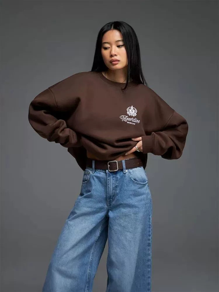 Avropa və Amerika üslubunda çaplı hərfli dairəvi yaxalı sviter