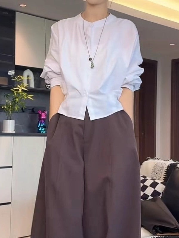 Qadınlar üçün böyük ölçülü, şık qara köynək, 2026-cı ilin yazının əvvəlləri üçün yeni model, geniş formalı, arıqladıcı, uzunqol köynək.