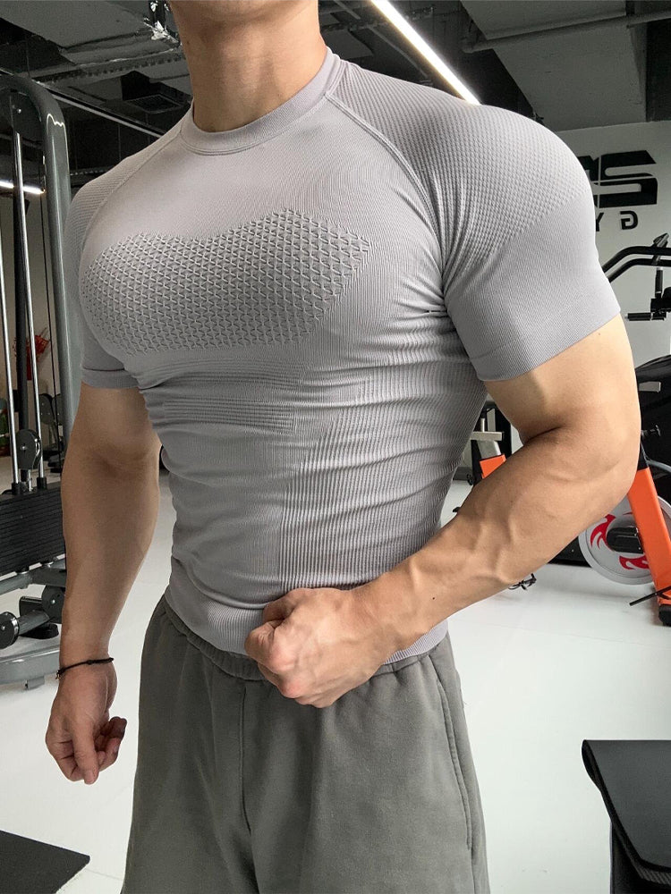 GYM elastik peşəkar fitness geyimi tikişsiz qısaqol idman köynəyi kişi qaçış məşqi tez quruyan sıxılma sıx açıq geyim