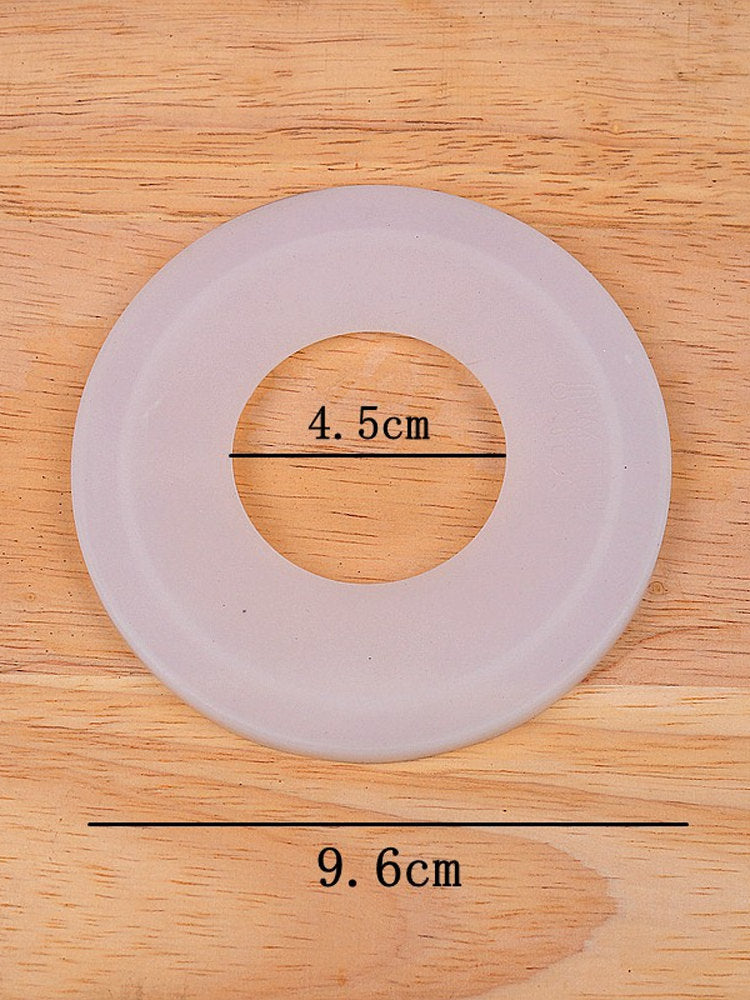 Silikon qapaq Orta xarici diametrdə deşik olan yumşaq silikon qapaq 9.6CM daxili diametri 4.5CM silikon qapaq