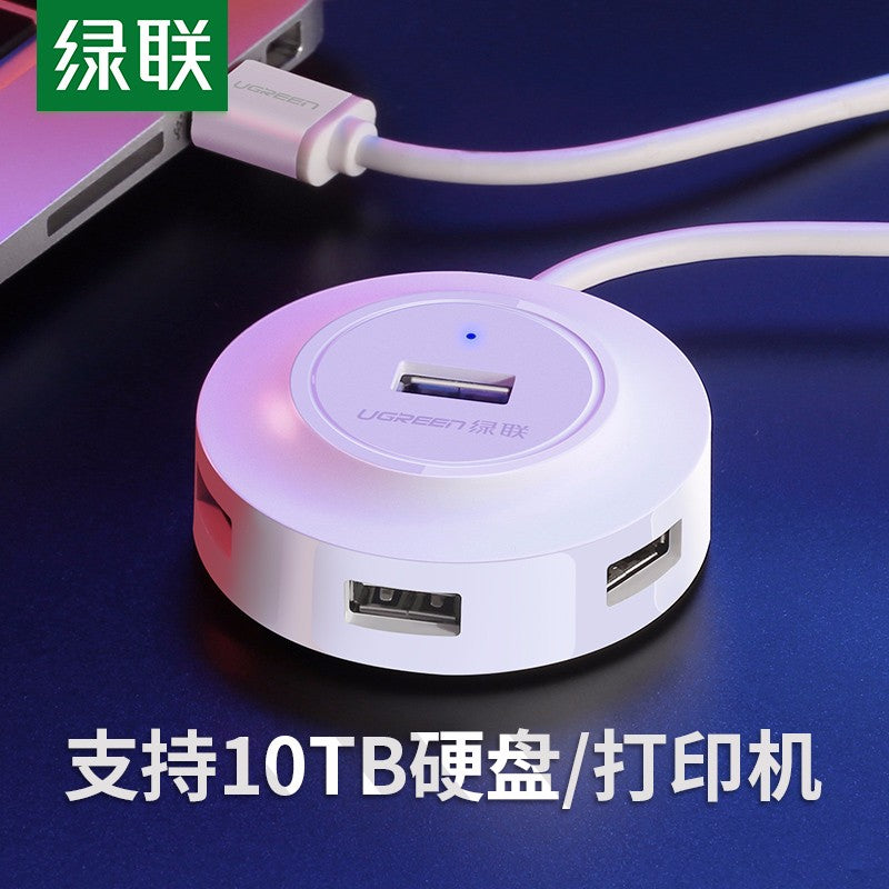 UGREEN Green Link USB Splitter 4 portlu 2.0HUB mərkəzini genişləndirərək Type-C noutbukunu dördə qədər genişləndirir.