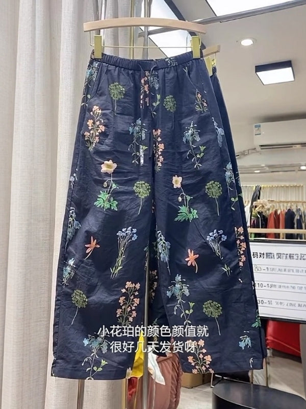 Qadınlar üçün naxışlı gündəlik şalvar, yay üslubunda, nazik, böyük ölçülü, arıqladıcı, qısa, yüksək belli, çoxfunksiyalı, boş, enli ayaqlı, çiçəkli naxışlı şalvar.