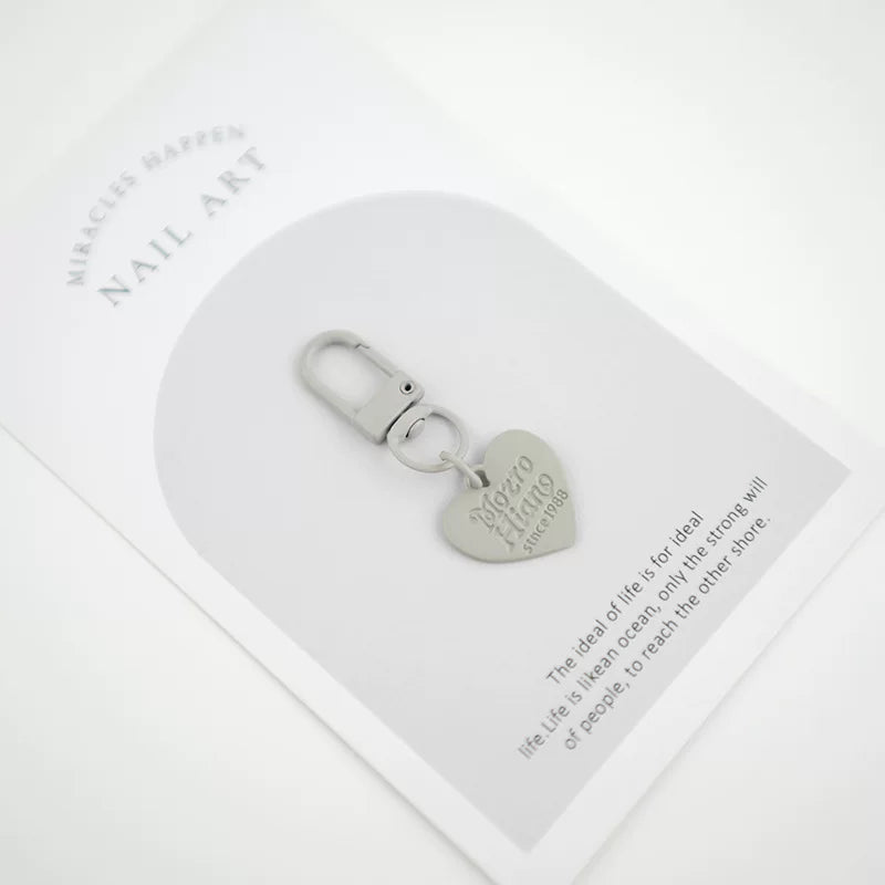 Ürək formalı kulon, konfet rəngli şarf, AirPods metal açar zənciri, Koreya hərfli qulaqcıqlar, çantalar üçün ürək formalı aksessuarlar.