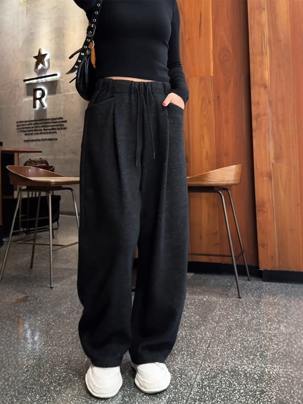 Qara rəngli, geniş ayaqlı, dartılan şalvar, yeni payız/qış stilində, böyük ölçüdə, geniş formalı, arıqladıcı, rahat, gündəlik, idman şalvarı.