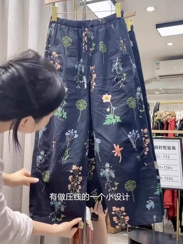 Qadınlar üçün naxışlı gündəlik şalvar, yay üslubunda, nazik, böyük ölçülü, arıqladıcı, qısa, yüksək belli, çoxfunksiyalı, boş, enli ayaqlı, çiçəkli naxışlı şalvar.