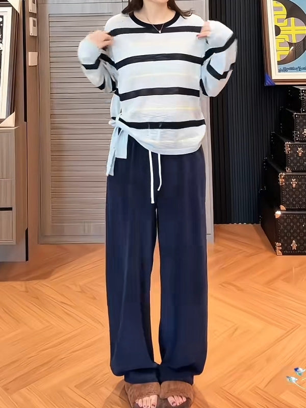 Böyük ölçülü, qalstuklu, uzunqollu, zolaqlı, erkən yaz, arıqlama və boş forma üçün ideal olan, daxili və ya əsas üst geyim kimi ideal olan qadın futbolkası.