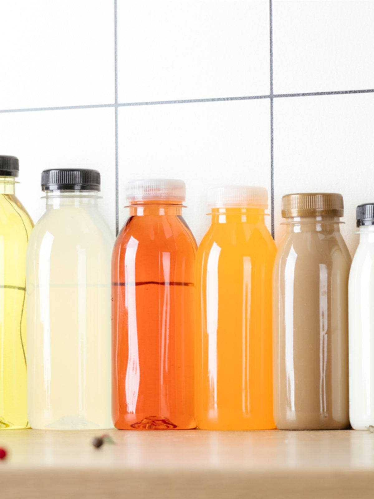 Birdəfəlik ev heyvanı içki şüşəsi plastik qida dərəcəli plastik şüşə şəffaf şirə şüşəsi götürmə fermenti şüşəsi süd çay şüşəsi