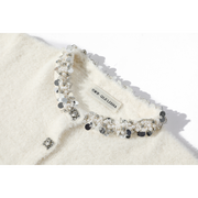 Cholisa-nın bu il qadınlar üçün unikal və gözəl hırka sviteri, payız və qış üçün mükəmməldir, rahat və zərif trikotaj tərzini əks etdirir.