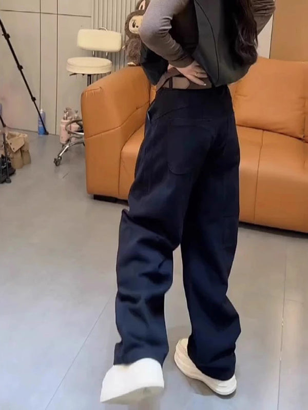 Qadınlar üçün böyük ölçülü tünd göy rəngli əyri cins şalvar, yaz stili, armud formalı fiqurlar üçün yaraşıqlı, yüksək belli, geniş bədən quruluşuna malik, düz ayaqlı enli şalvar.