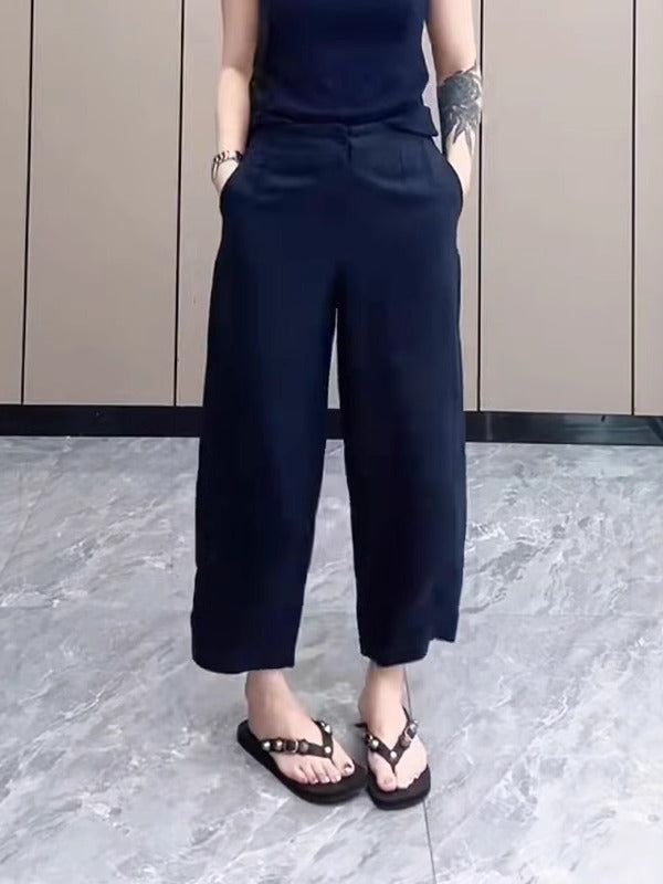 Qadınlar üçün böyük ölçülü tünd göy rəngli, düz ayaqlı qısa şalvar, 2026-cı ilin yayı, nazik, geniş formalı, arıqladıcı, çoxfunksiyalı, ombanı örtən gündəlik şalvar.