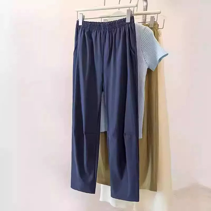 Kiçik armud formalı fiqurlar üçün böyük ölçülü qadınlar üçün 2026 yay yüksək belli düz ayaqlı, tez quruyan qısa hərəm gündəlik şalvarı