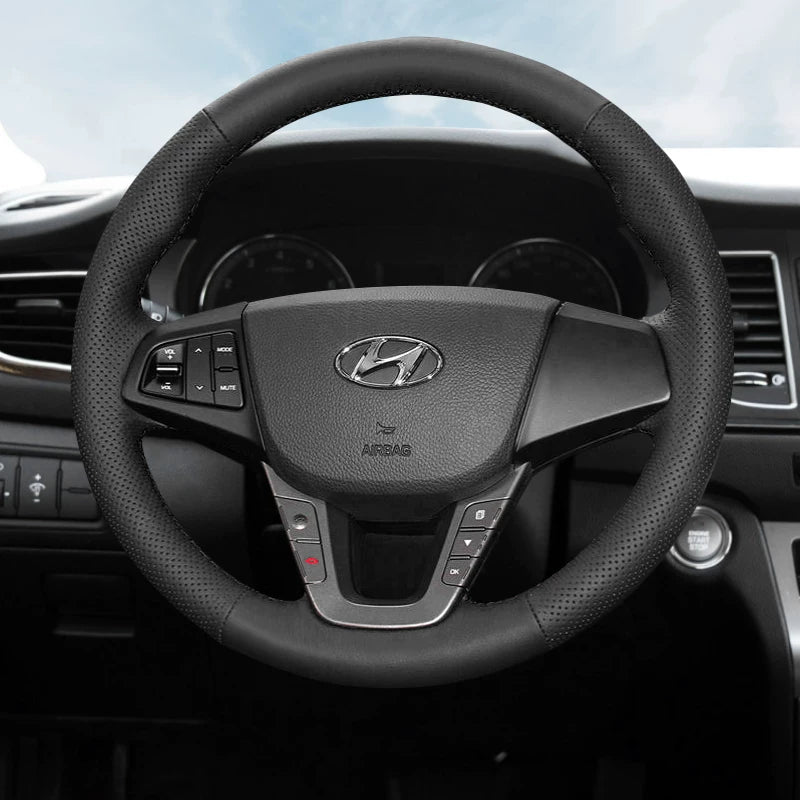 Hyundai Elantra, Hyundai Mistra, Hyundai Yuedong, Tucson və Langdong ix35 üçün qış versiyası üçün əl ilə tikilmiş orijinal dəri sükan örtüyü.