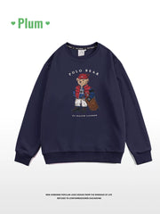 Zhou Yutong-un Amerika retro tünd göy rəngli sviter, qadın 2025-ci il yeni payız və qış stilində, flis astarlı və kiçik ayı naxışı ilə qalınlaşdırılmış.