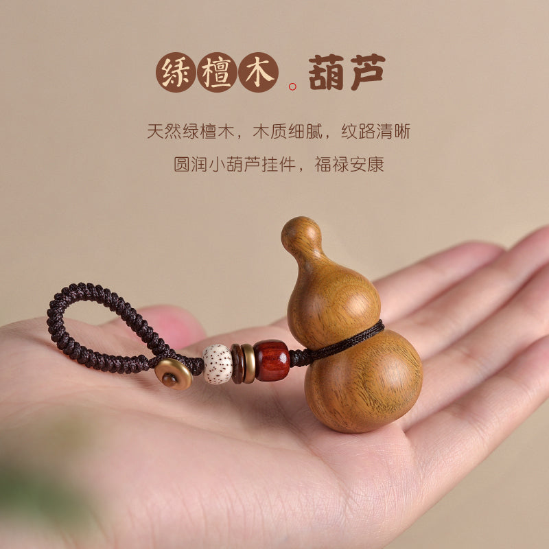 Bənövşəyi səndəl ağacından hazırlanmış balqabaq avtomobil açar zənciri, yaşıl səndəl ağacından hazırlanmış sülh və bəxt kulonu, kişilər və qadınlar üçün yaradıcı portativ zərgərlik.