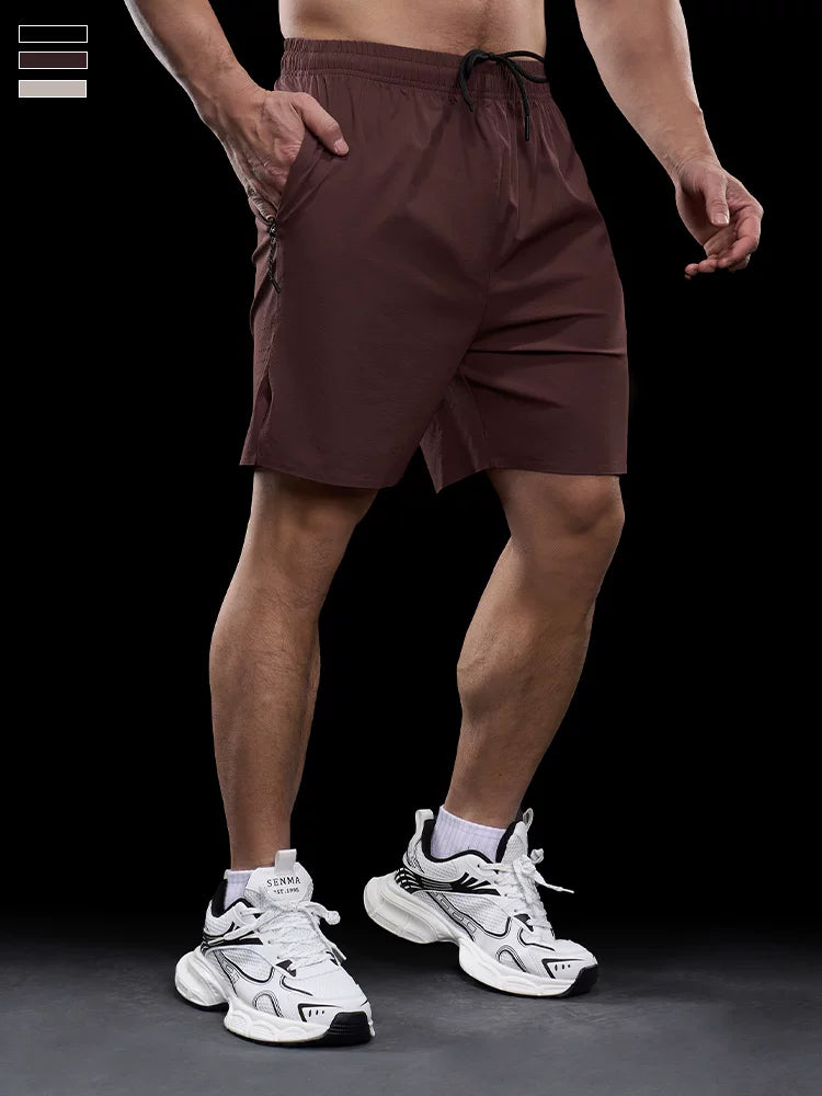 Həddindən artıq əzələli yay kişi idman fitnes tez quruyan qaçış şortu, elastik kişi yeni stili