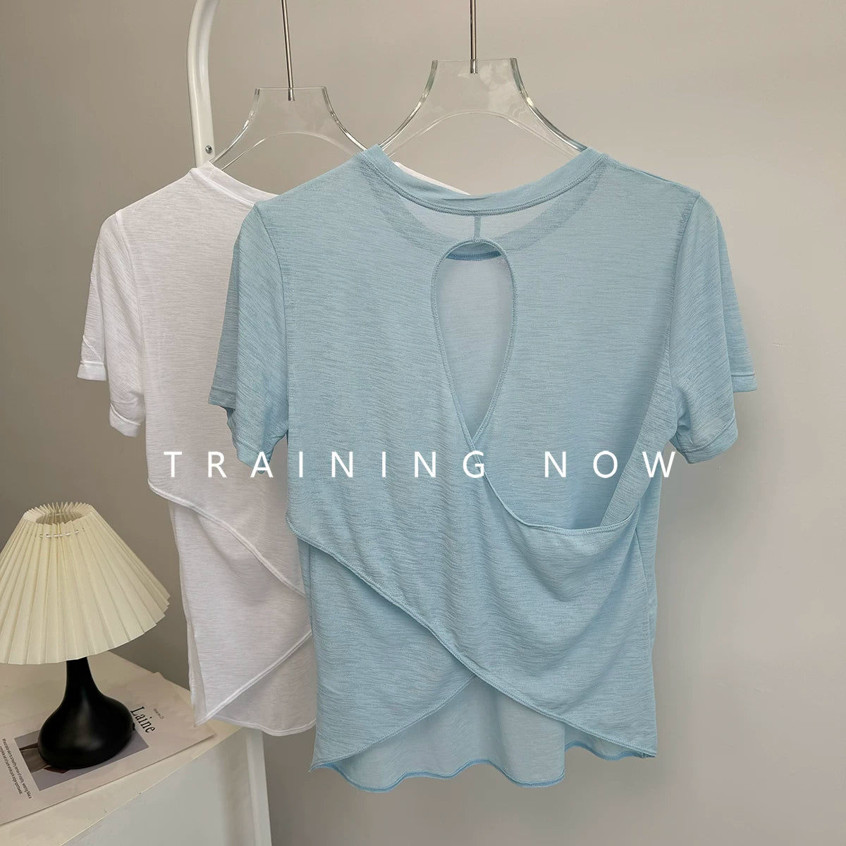 Fitness kostyumu qadın yay içi boş gözəl arxa idman qısaqol köynək, nəfəs ala bilən peşəkar Pilates yoga geyimi