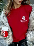 Avropa və Amerika üslubunda çaplı hərfli dairəvi yaxalı sviter